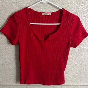 red v-cut crop top